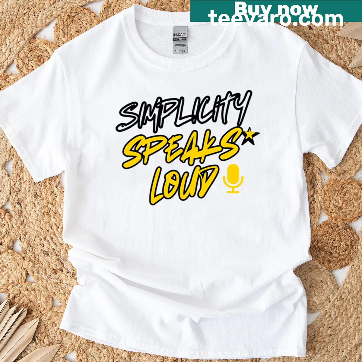 T-shirt featuring the phrase 'Simplicity Speaks Loud' in clean typography — on a men's t-shirt