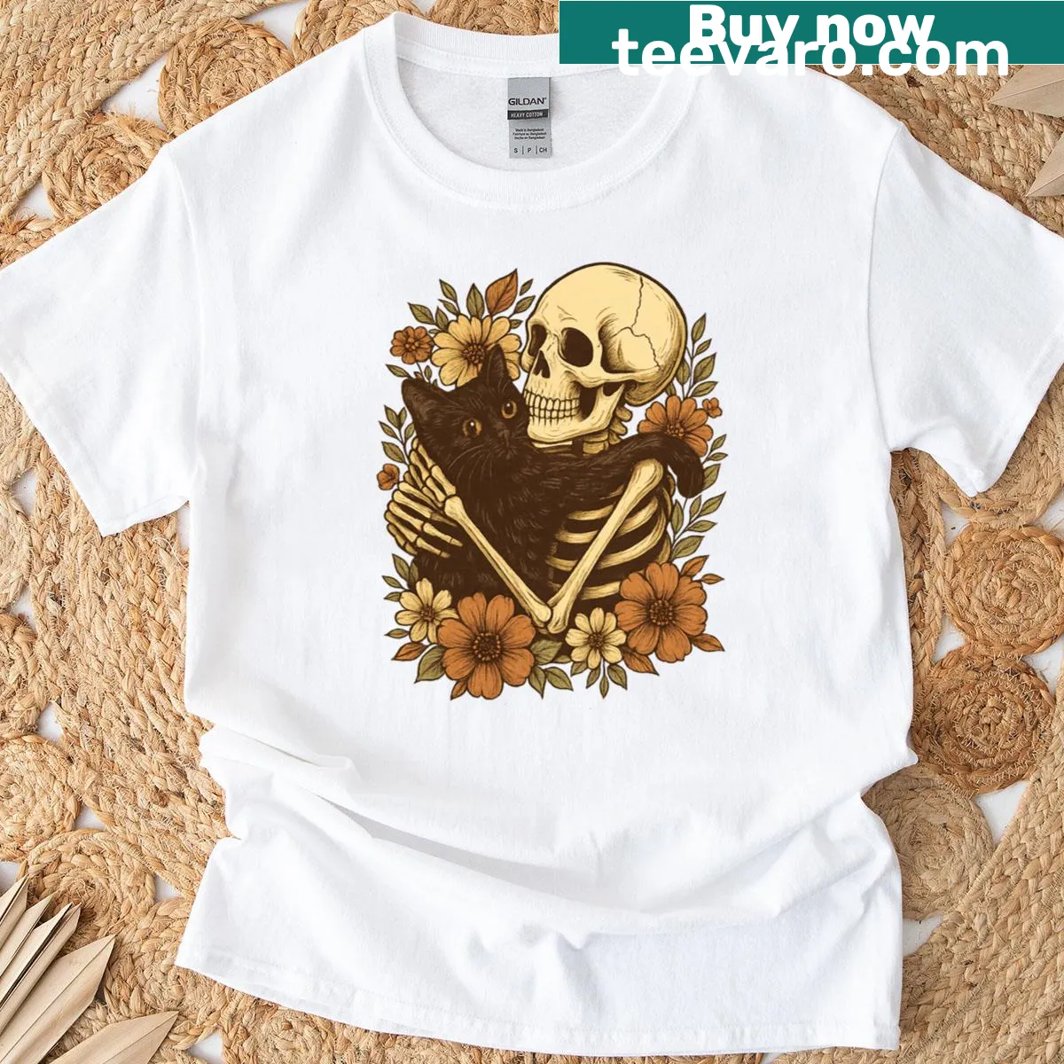 Cartoon skeleton hugging a black cat with floral design — on a men's t-shirt