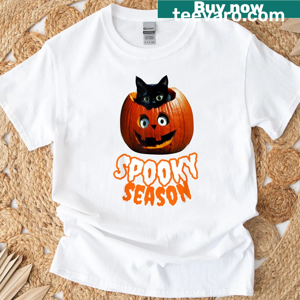 Illustration of a ghost, black cat, and pumpkin for Halloween — on a men's t-shirt
