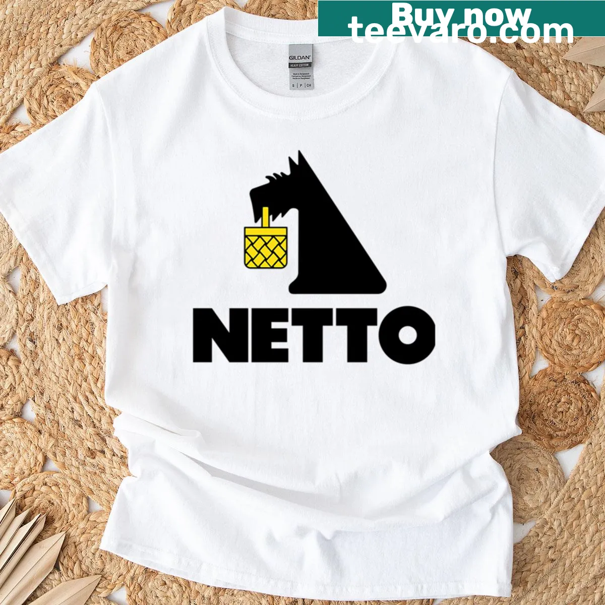 T-shirt depicting a sunset over a supermarket scene — on a men's t-shirt