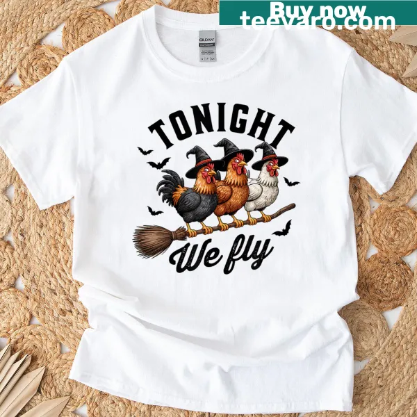 Funny Halloween T-shirt featuring a cartoon chicken on a broom