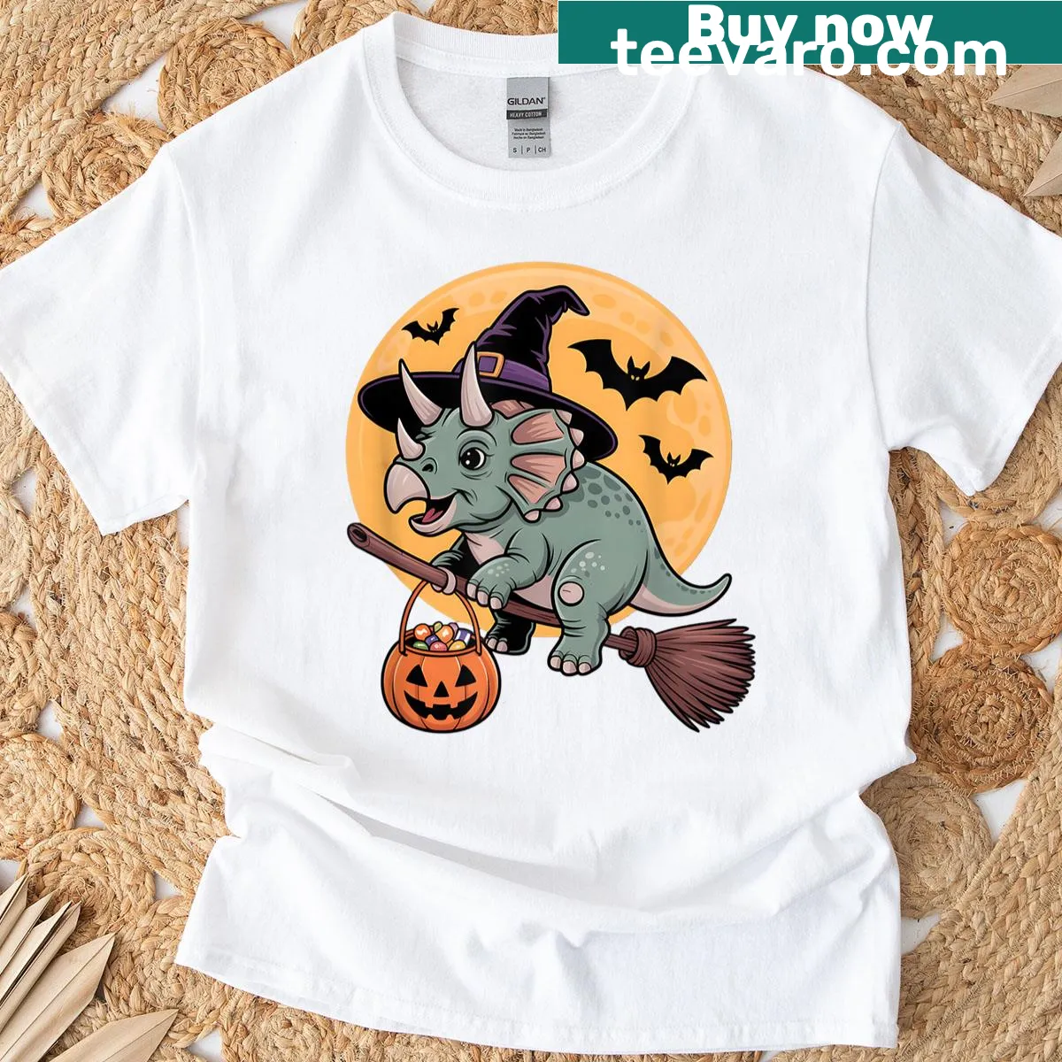 Cartoon triceratops in a witch hat with pumpkins for Halloween — on a men's t-shirt