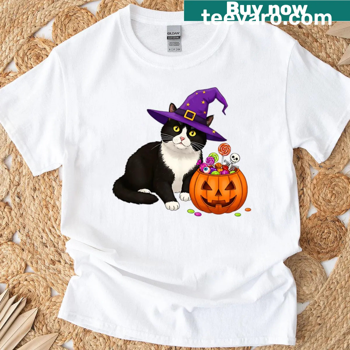 T-shirt featuring a tuxedo cat in witch attire with a candy basket, perfect for Halloween. — on a men's t-shirt