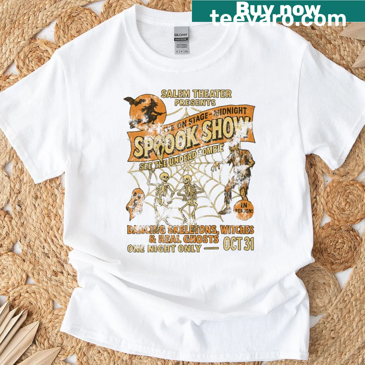 Vintage Halloween poster t-shirt featuring dancing skeletons and a witch — on a men's t-shirt