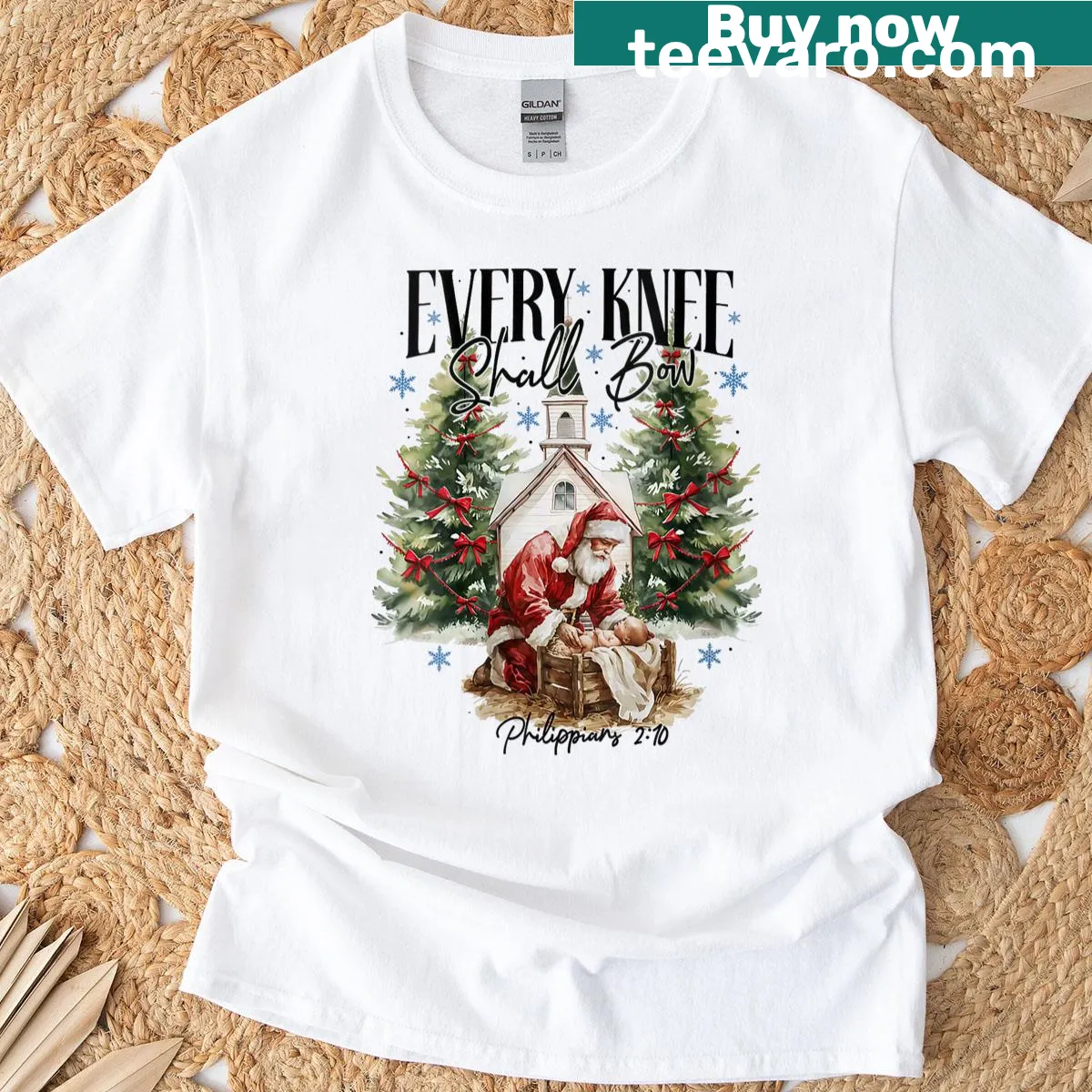 Nativity scene graphic with 'Every Knee Shall Bow' text for Christmas — on a men's t-shirt