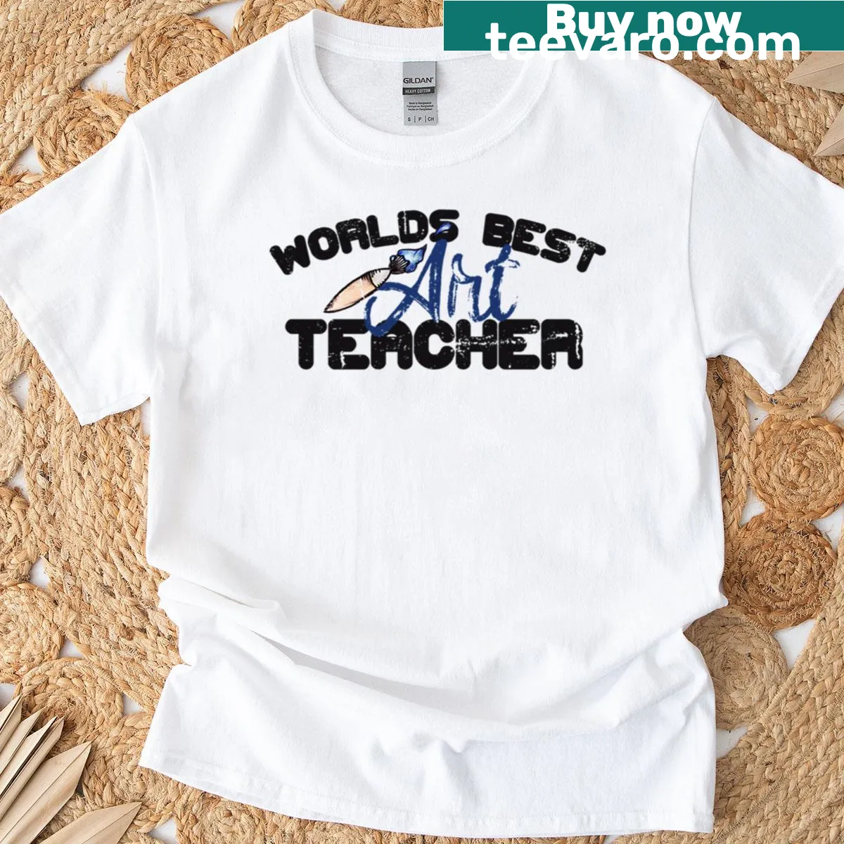 World's Best Art Teacher proud typography t-shirt — on a men's t-shirt
