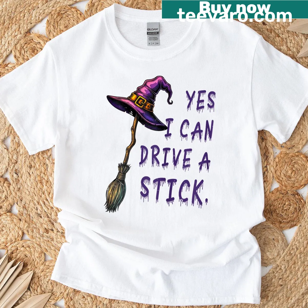 Funny Halloween T-shirt with text: Yes I Can Drive A Stick and a witch hat — on a men's t-shirt