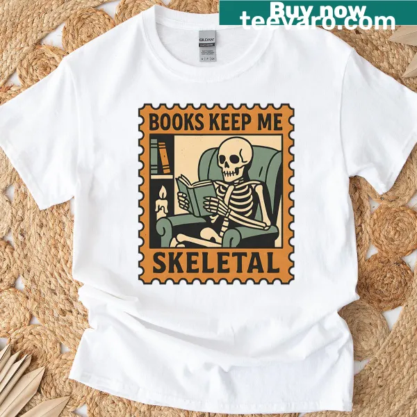 Skeleton reading a book with the phrase 'Books Keep Me Skeletal'