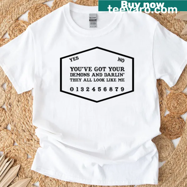 Black T-shirt with bold demon-themed typography.