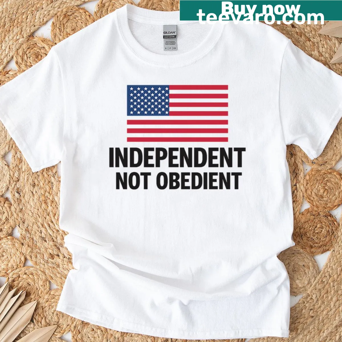 Minimalist T-shirt with a bold independence slogan and flag design — on a men's t-shirt