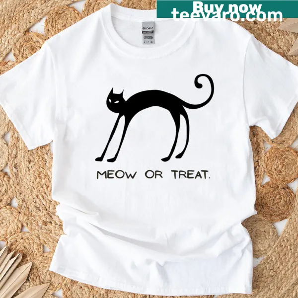 Oversized T-shirt with a humorous 'Meow Or Treat' Halloween cat pun.