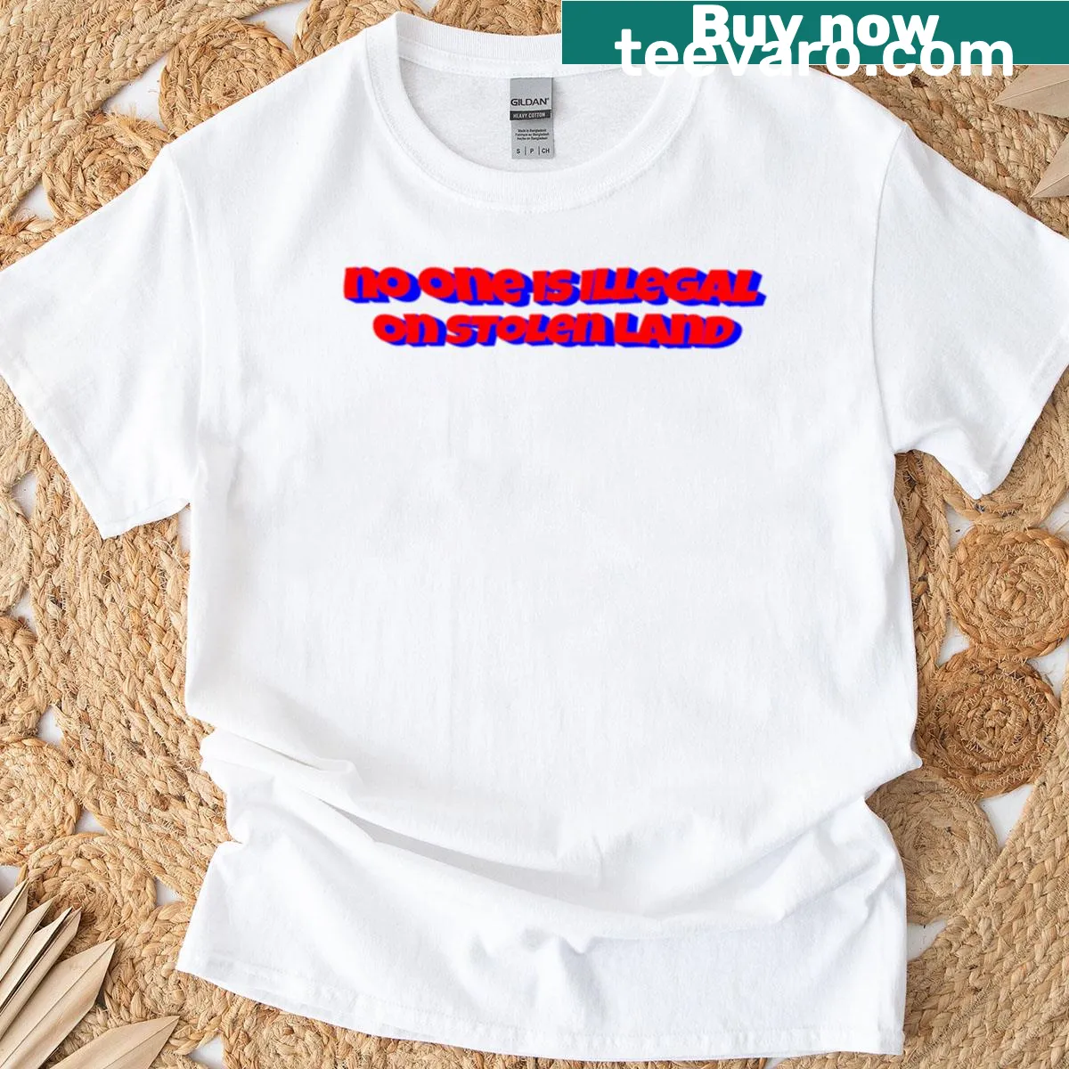 T-shirt featuring the phrase 'No One Is Illegal On Stolen Land' in bold letters — on a men's t-shirt