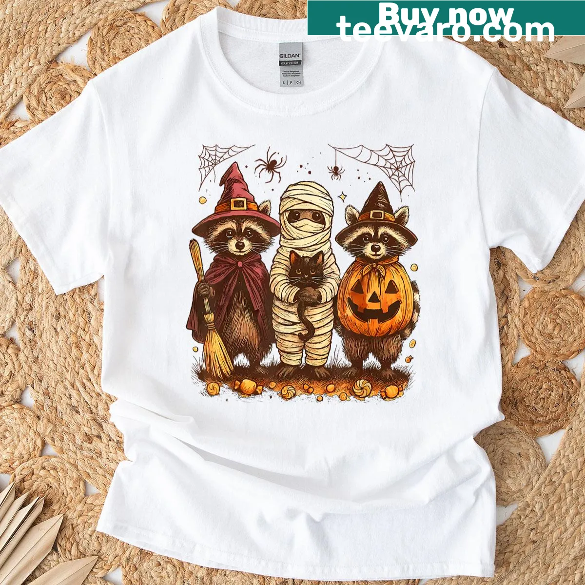 Retro raccoon witch with pumpkins on Halloween T-shirt — on a men's t-shirt