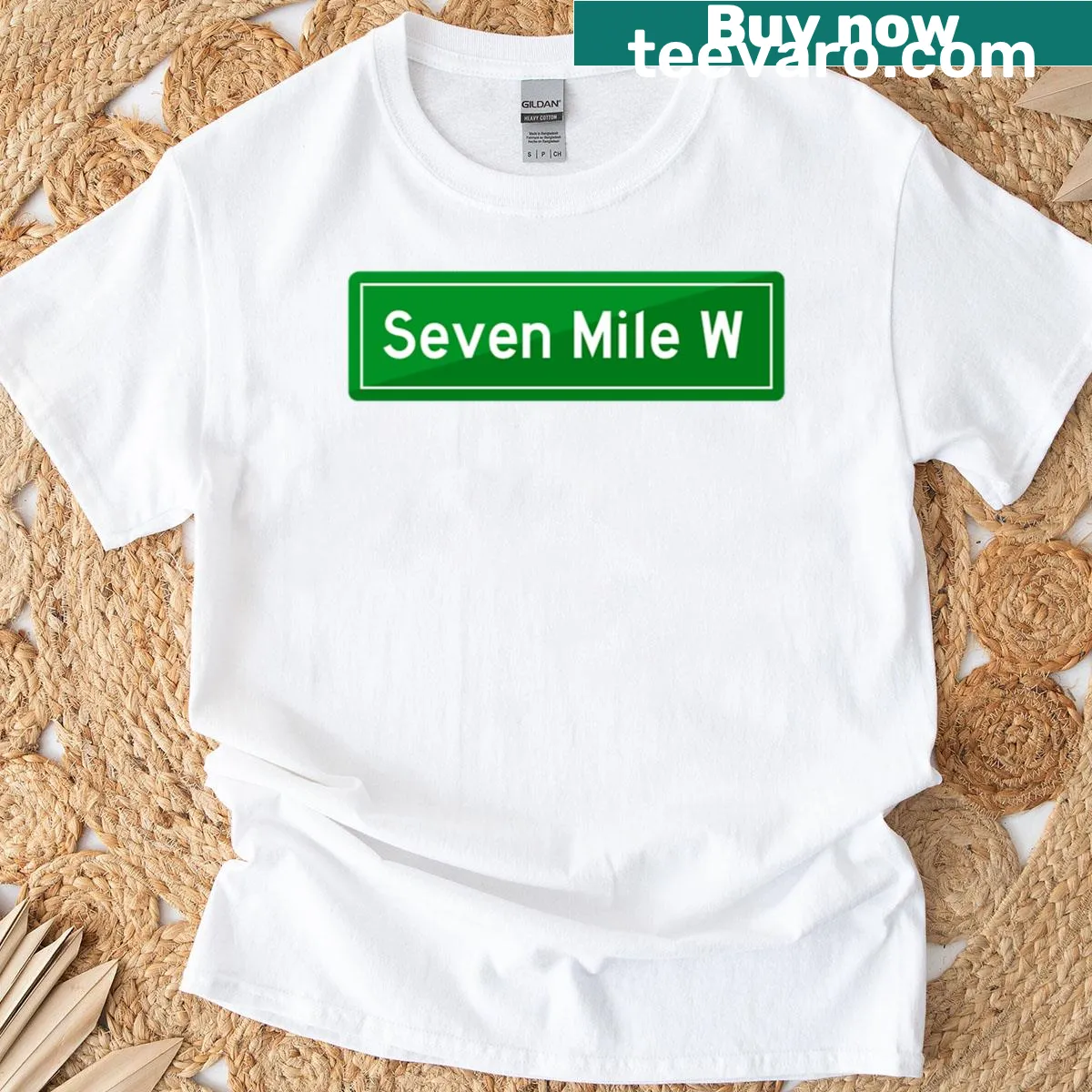 Oversized t-shirt with a street sign design reading 'Seven Mile' — on a men's t-shirt