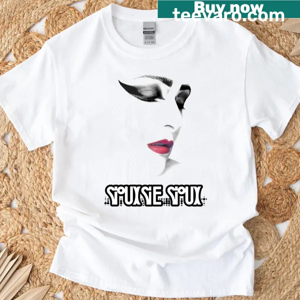 Minimalist line-art face design on a t-shirt.