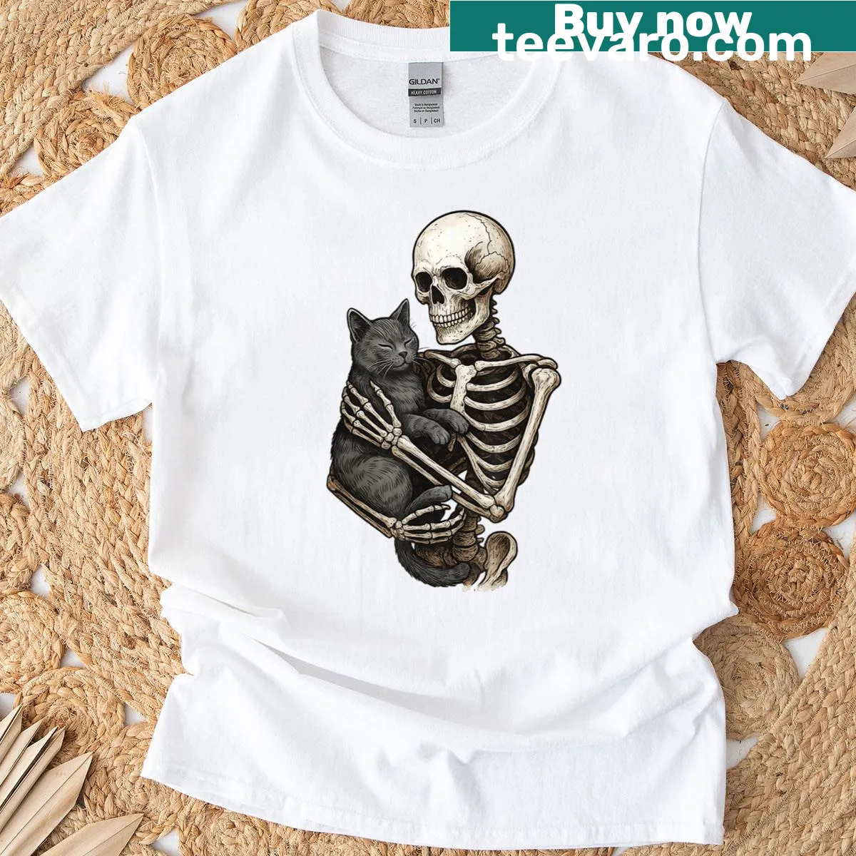 Cute Halloween T-shirt featuring a skeleton hugging a cat. — on a men's t-shirt