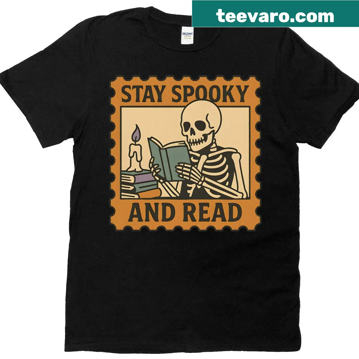 Skeleton reading a book graphic on a t-shirt — on a men's t-shirt