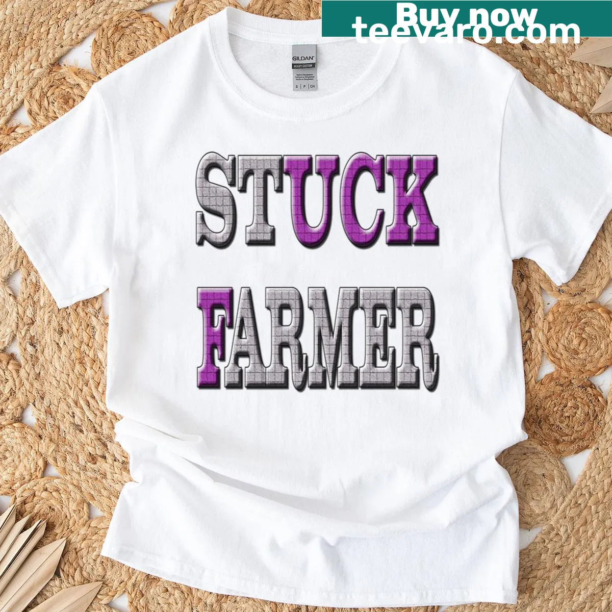 Humorous T-shirt featuring the phrase 'Stuck Farmer' with a nod to the UK Prime Minister. — on a men's t-shirt
