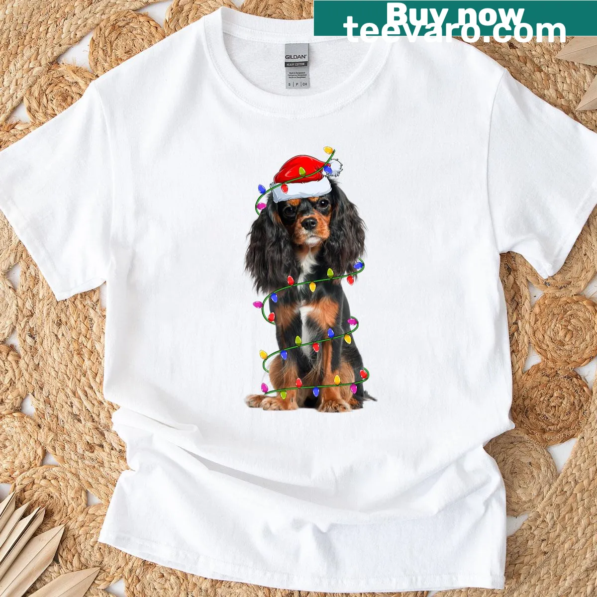 Christmas t-shirt featuring Cavalier King Charles Spaniel with lights — on a men's t-shirt
