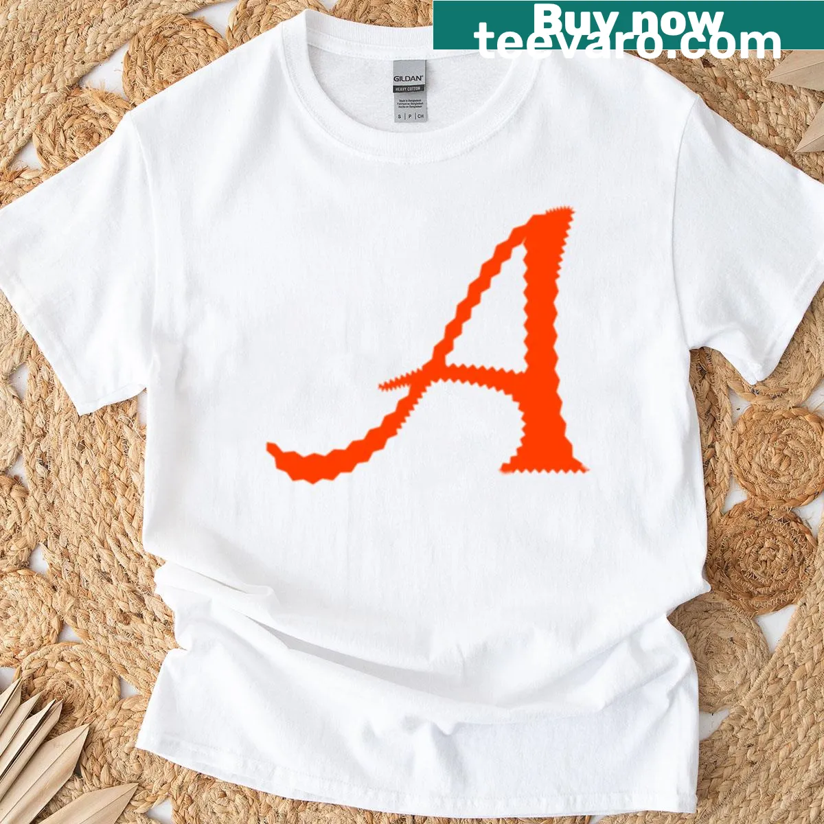 T-shirt featuring a spiky letter A in stylish script — on a men's t-shirt