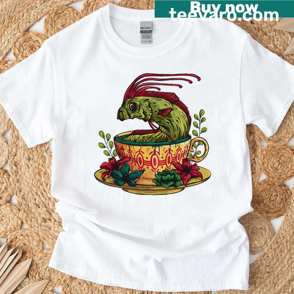 Oversized T-shirt featuring a whimsical fish in a cup graphic. — on a men's t-shirt