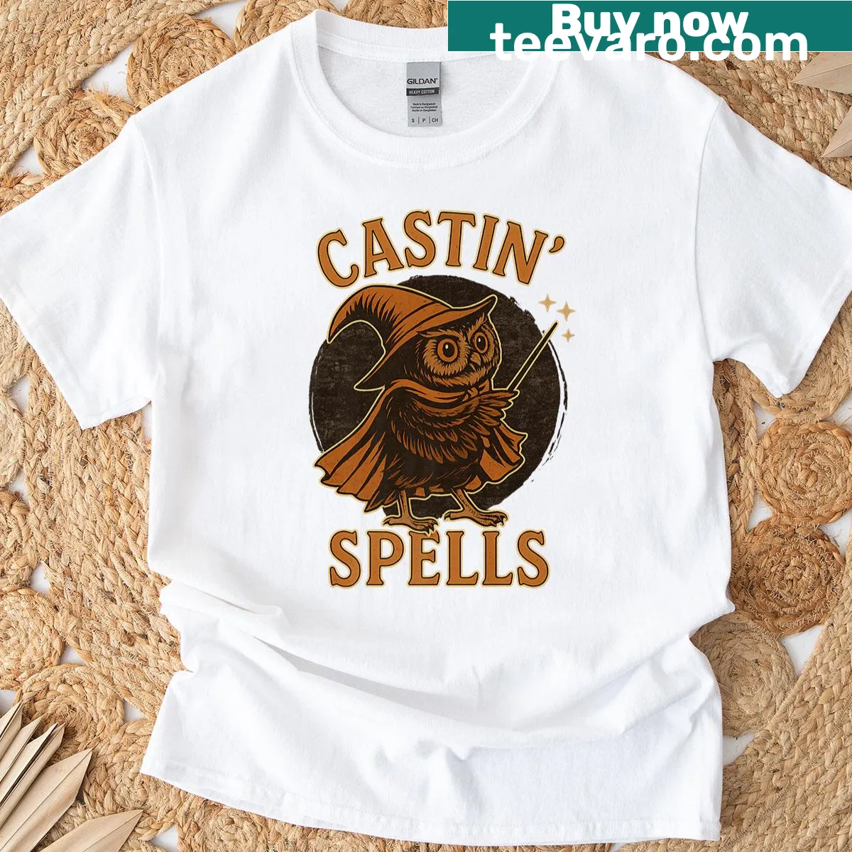 Cartoon owl wizard casting spells for Halloween fun. — on a men's t-shirt