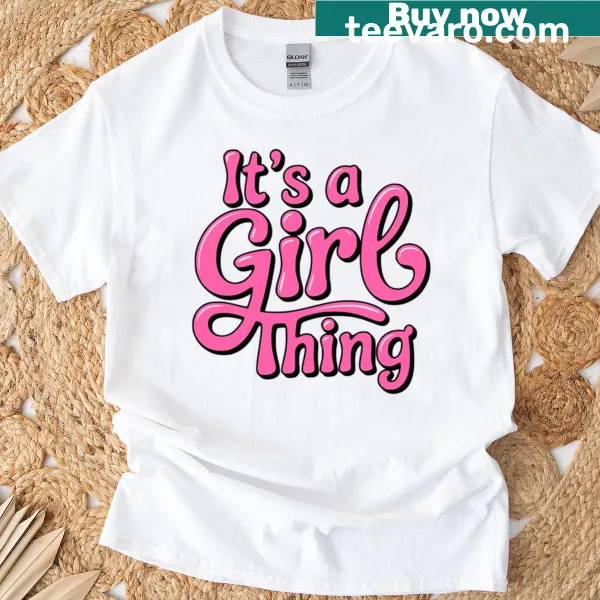 Pink t-shirt with the phrase 'It's A Girl Thing' in playful typography