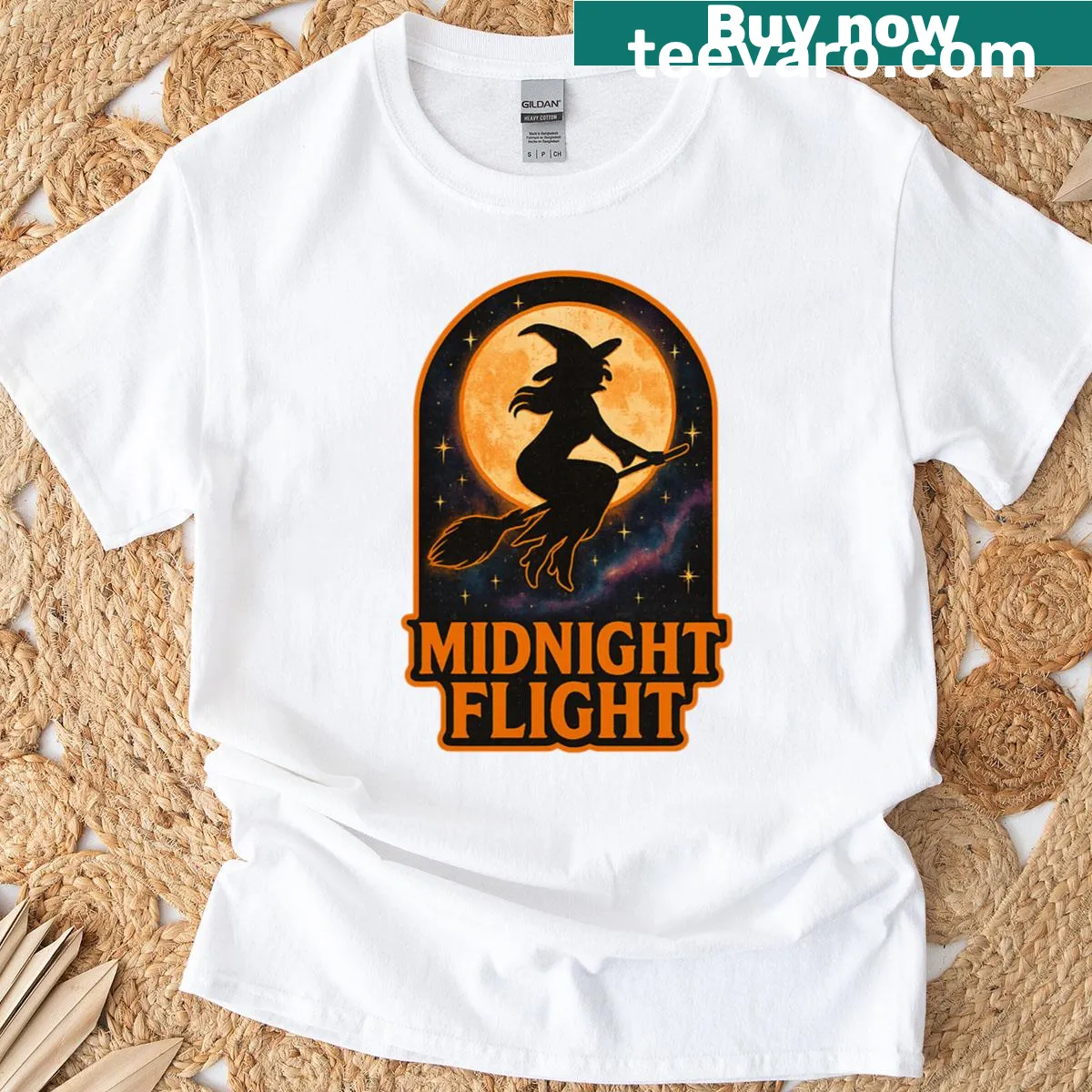 Vintage witch on broomstick flying in front of full moon illustration — on a men's t-shirt