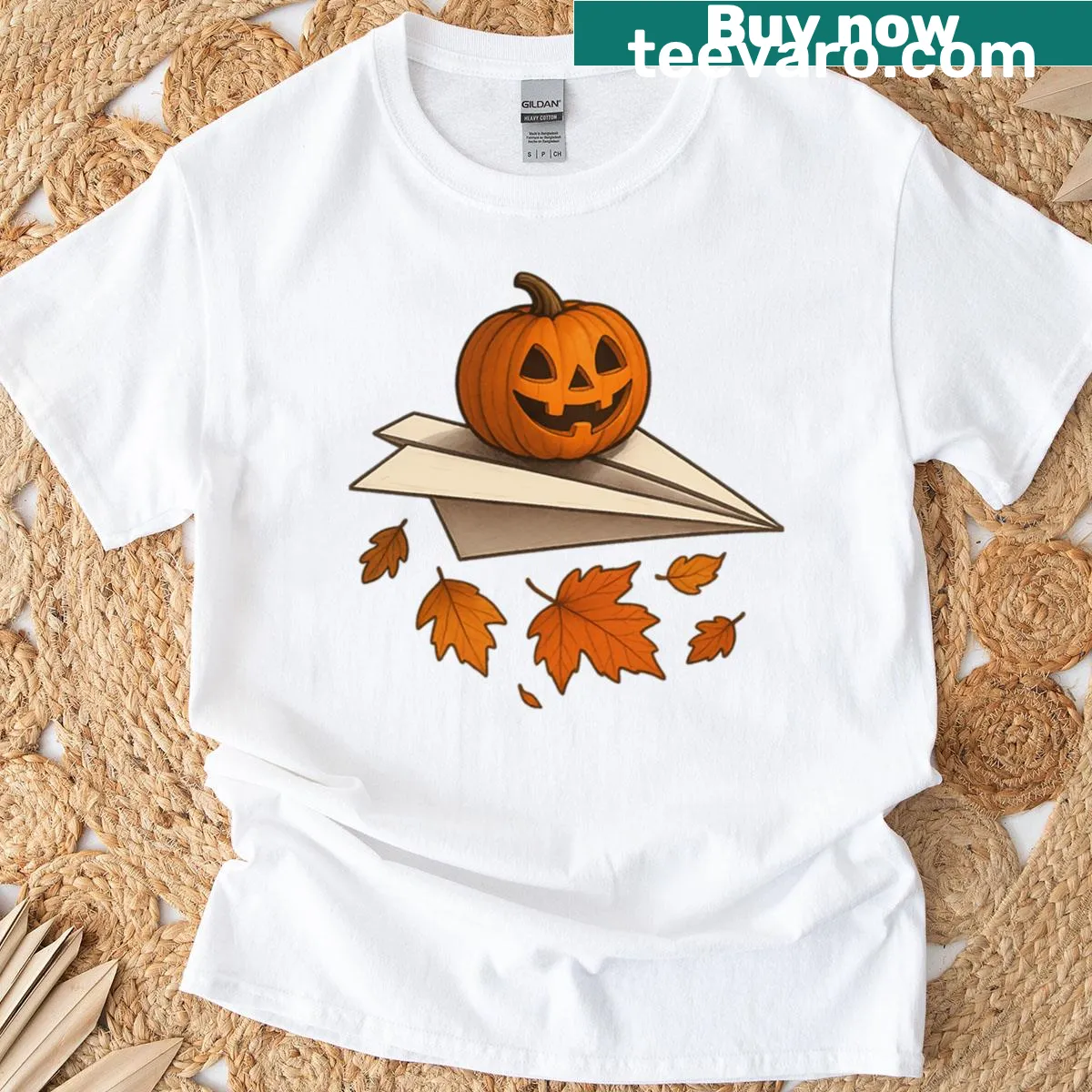 Cute Halloween-themed T-shirt with jack-o-lantern and autumn leaves — on a men's t-shirt