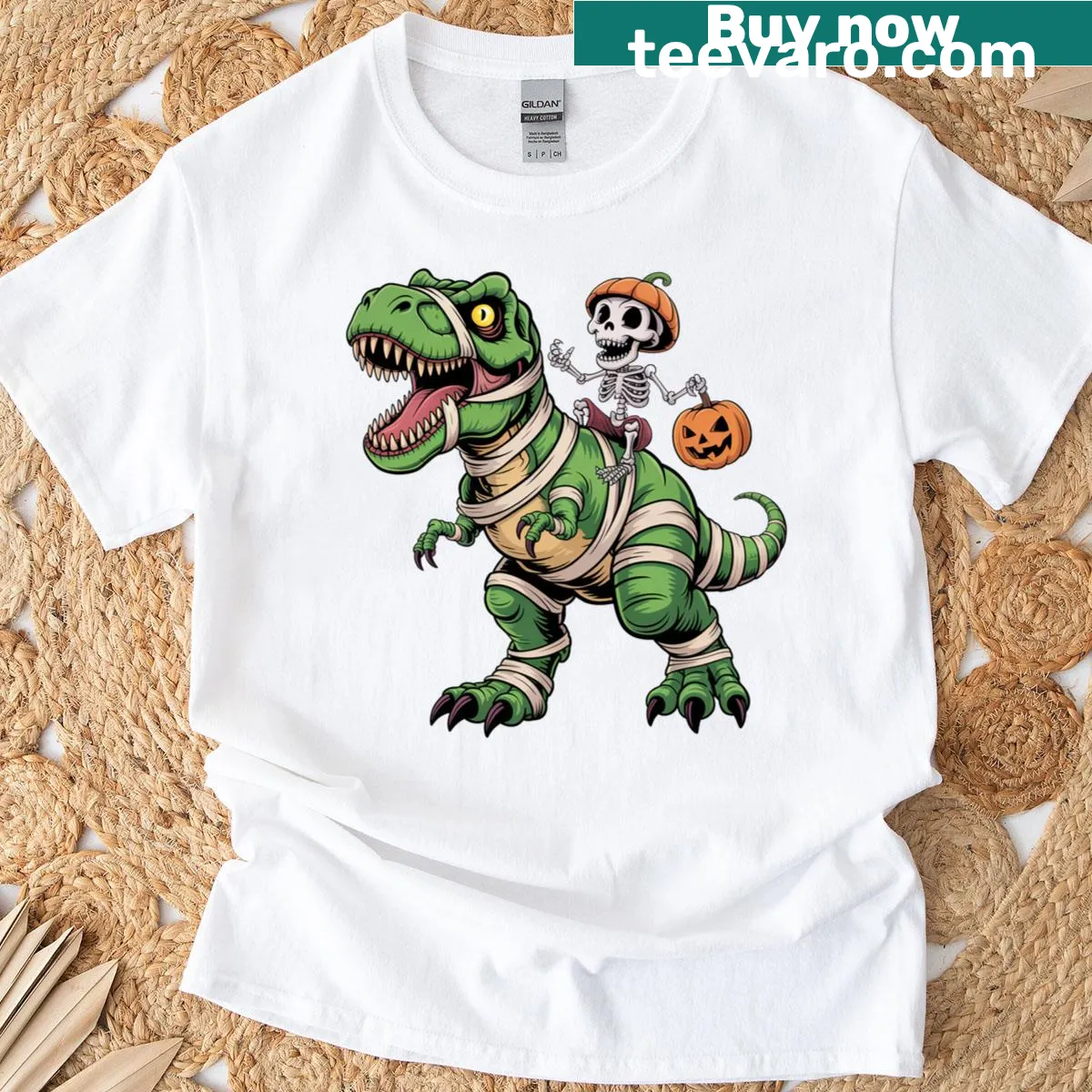 Skeleton riding a mummy dinosaur graphic on a T-shirt — on a men's t-shirt