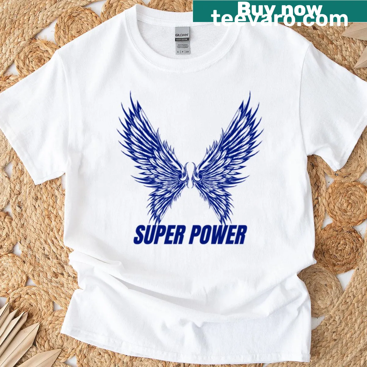 Illustrated blue angel wings graphic on a T-shirt. — on a men's t-shirt