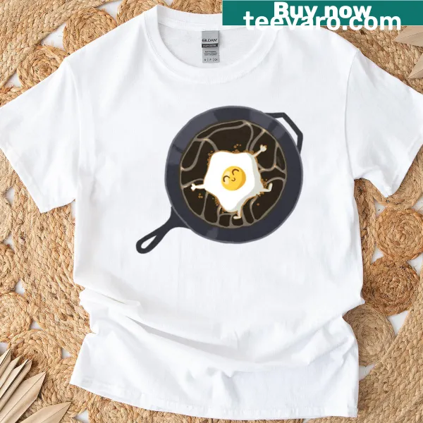 Cartoon egg swimming in frying pan T-shirt design