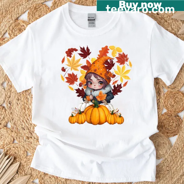 Gnome holding a pumpkin heart graphic on an autumn-themed T-shirt