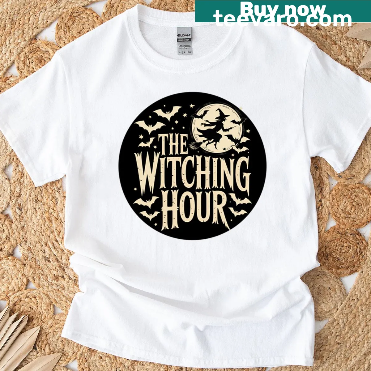 Oversized t-shirt with a whimsical witch flying and playful bats design — on a men's t-shirt