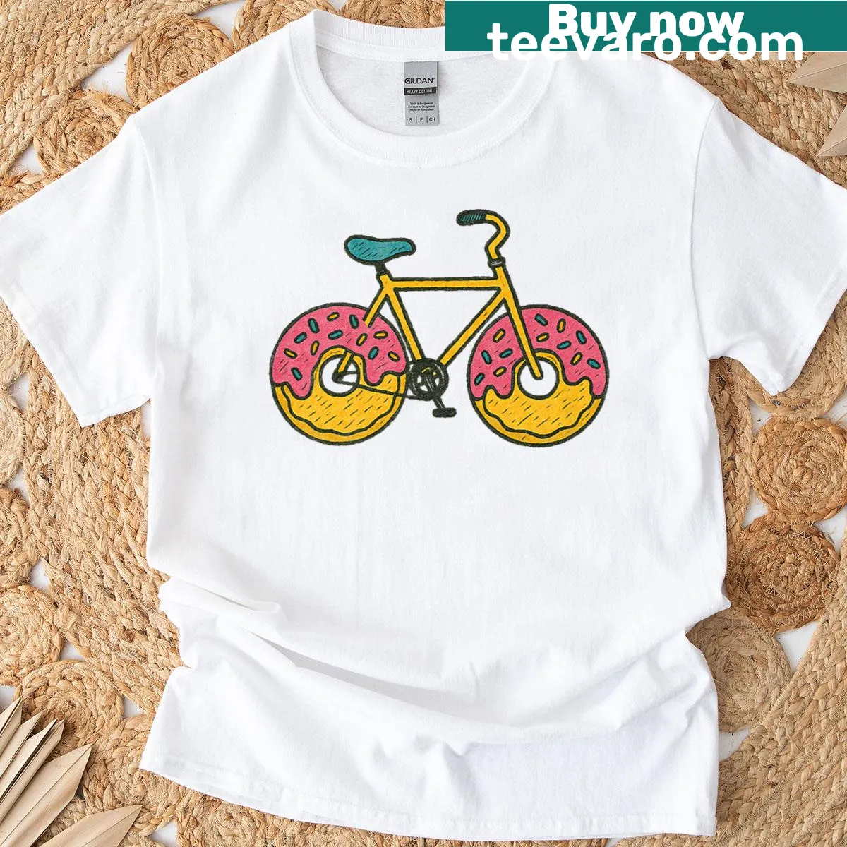 Cartoon T-shirt featuring a bike with donut wheels in a fun design — on a men's t-shirt