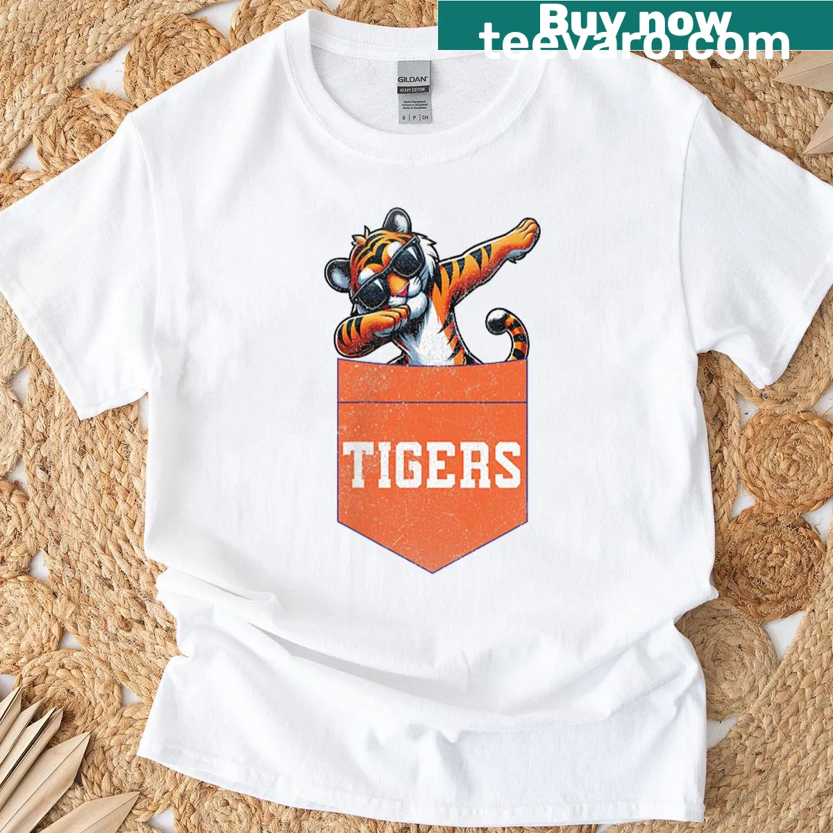 Cartoon graphic of a dabbing tiger in a pocket — on a men's t-shirt