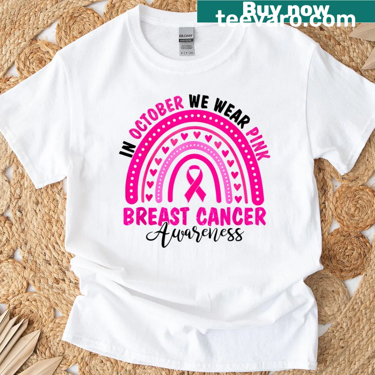 Breast cancer awareness t-shirt with rainbow text and supportive message — on a men's t-shirt