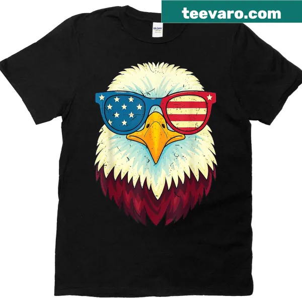 Bald eagle graphic soaring above the American flag on T-shirt.