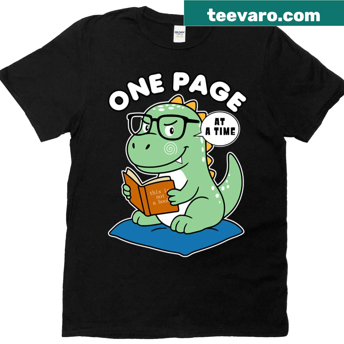 An oversized t-shirt with an inspirational message: 'One Page At A Time.' — on a men's t-shirt
