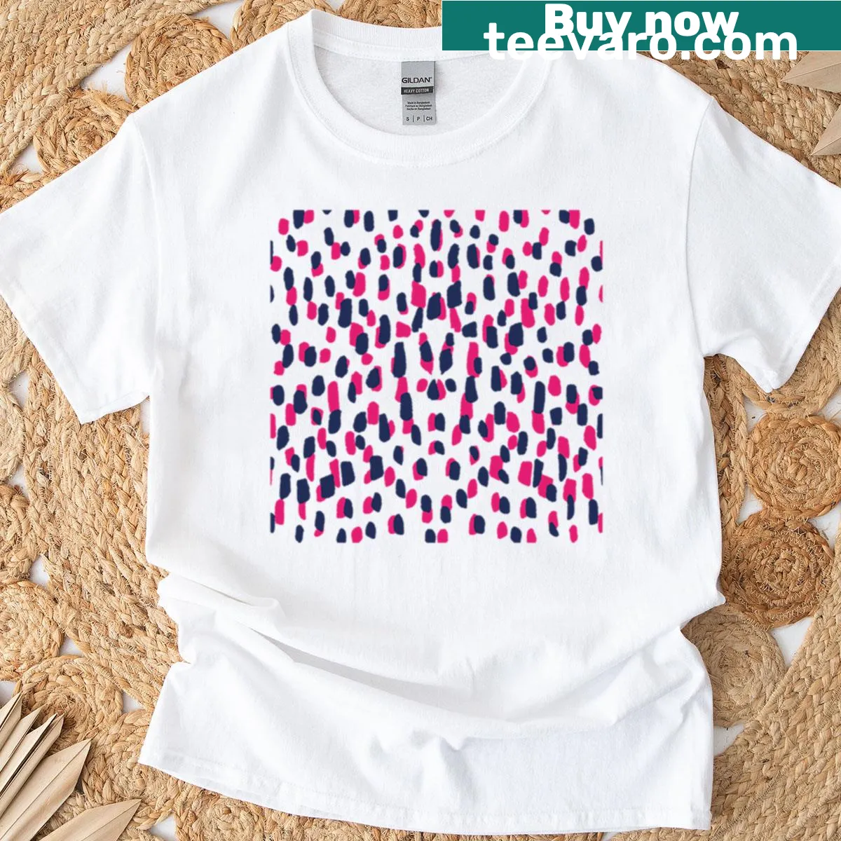 Playful T-shirt with abstract pink and blue confetti design — on a men's t-shirt