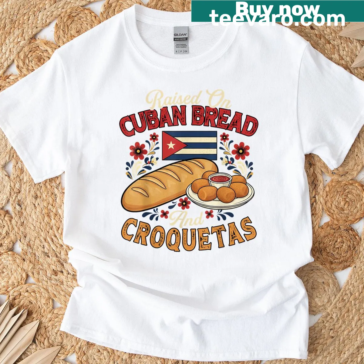 Cuban food-themed T-shirt with bread and croquetas illustration — on a men's t-shirt