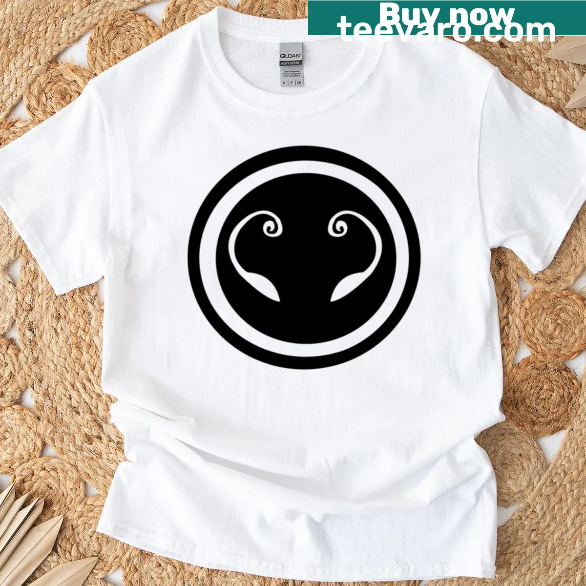 Eerie T-shirt featuring an illustration of a ghost in a shroud. — on a men's t-shirt