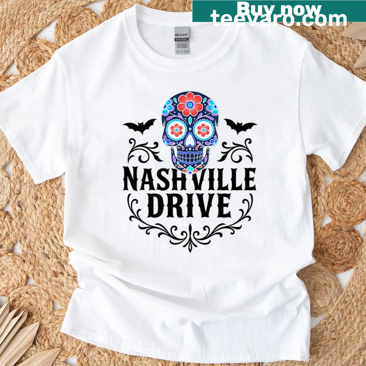 Sugar skull graphic with bats for Halloween — on a men's t-shirt