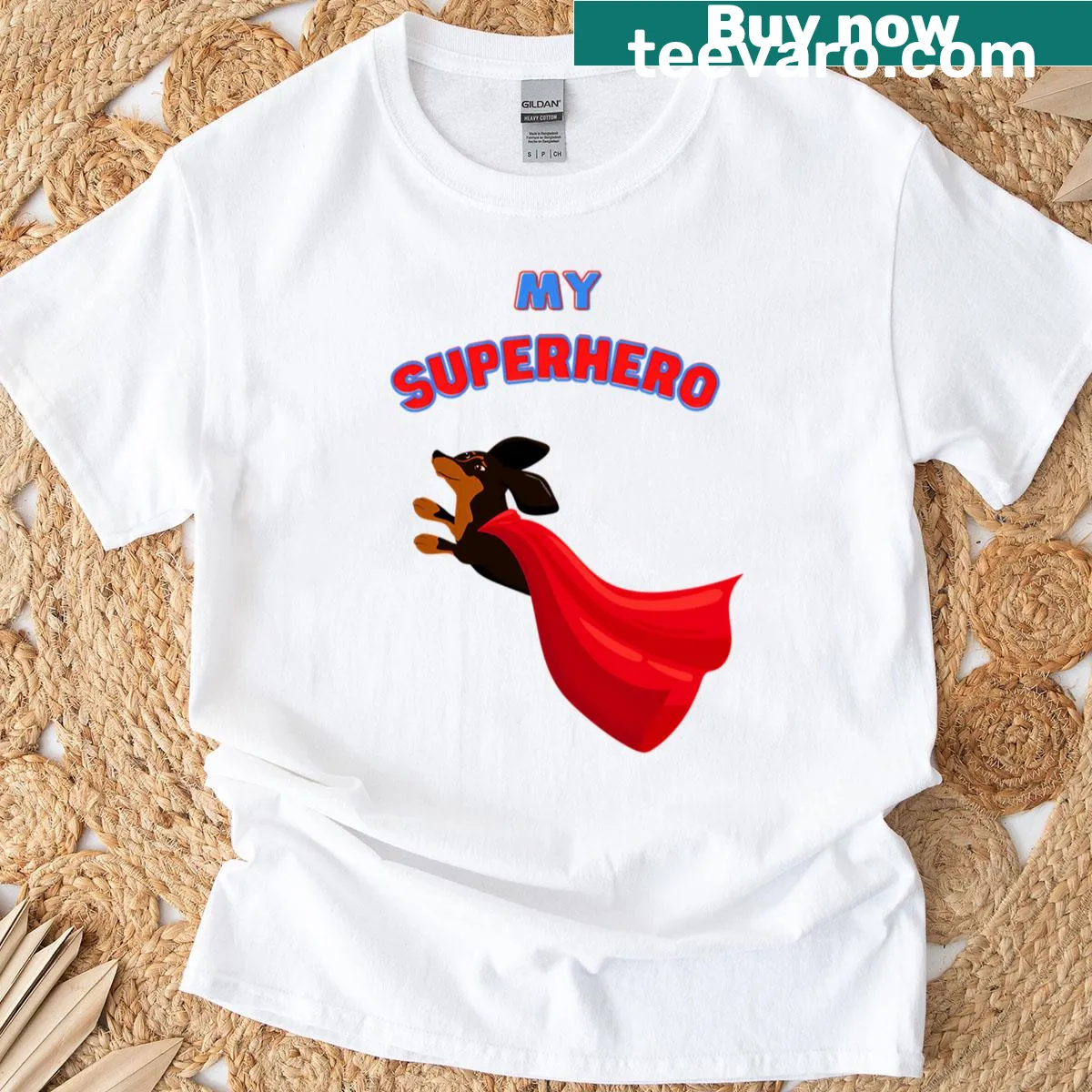Illustrated superhero dachshund graphic T-shirt — on a men's t-shirt