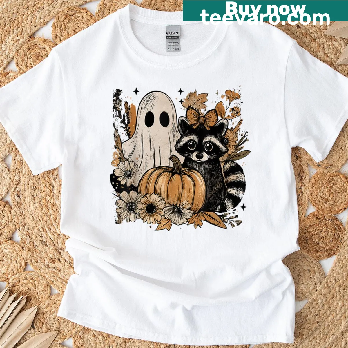 A cute Halloween graphic with a ghost holding a raccoon and floral designs. — on a men's t-shirt