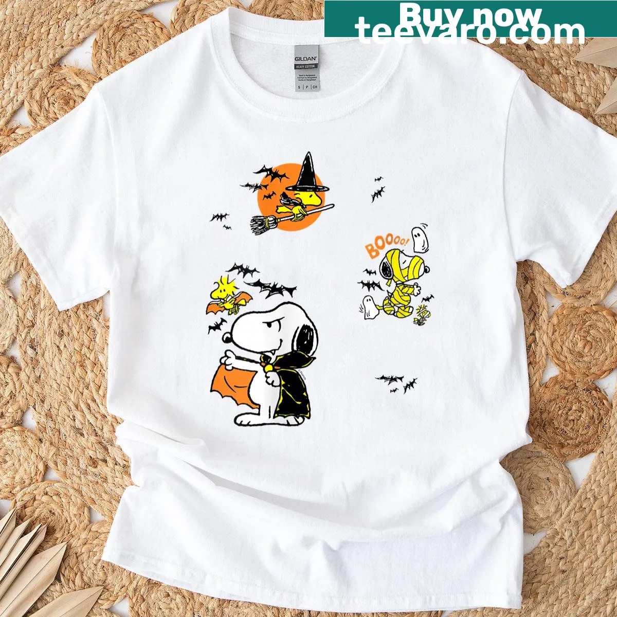Snoopy and Woodstock Halloween graphic on a woman's T-shirt — on a men's t-shirt