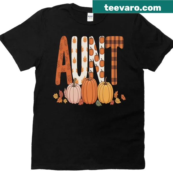 Autumn-themed T-shirt with pumpkins and falling leaves design.