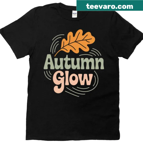 Playful falling leaf graphic T-shirt celebrating autumn.