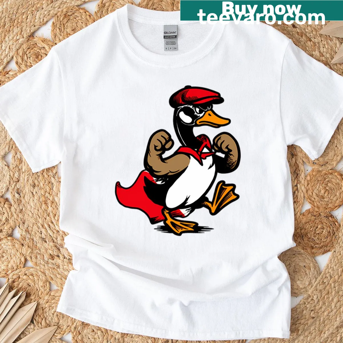 T-shirt featuring a humorous illustration of a cobra chicken. — on a men's t-shirt