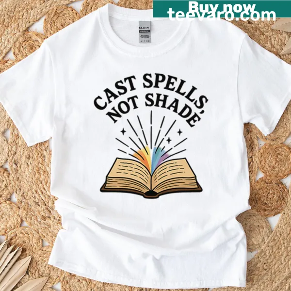 Witchy T-shirt featuring 'Cast Spells Not Shade' with spell book design